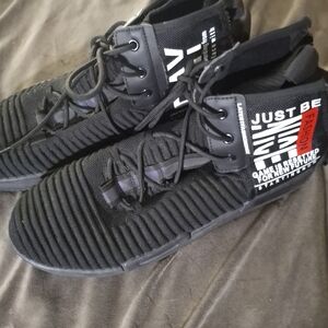 Black High-Top Sneakers with Red Accent